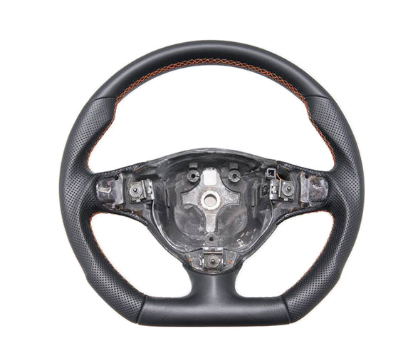 Modified steering wheel for Alfa Romeo 147 GT made with combination of smooth and perforated premium leather with red stitching